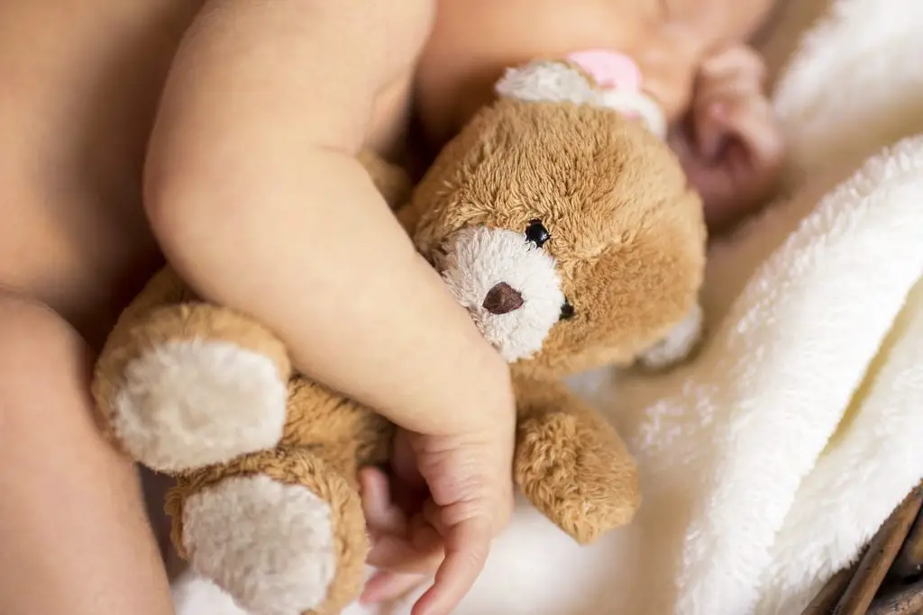 How to teach a baby to sleep through the night. Give them a soother