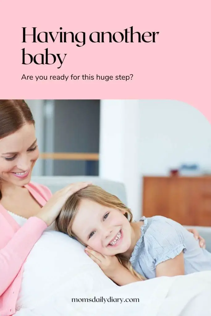 Pinterest pin with text "Having another baby. Are you ready for this huge step" and image of a pregnant woman with her older child.